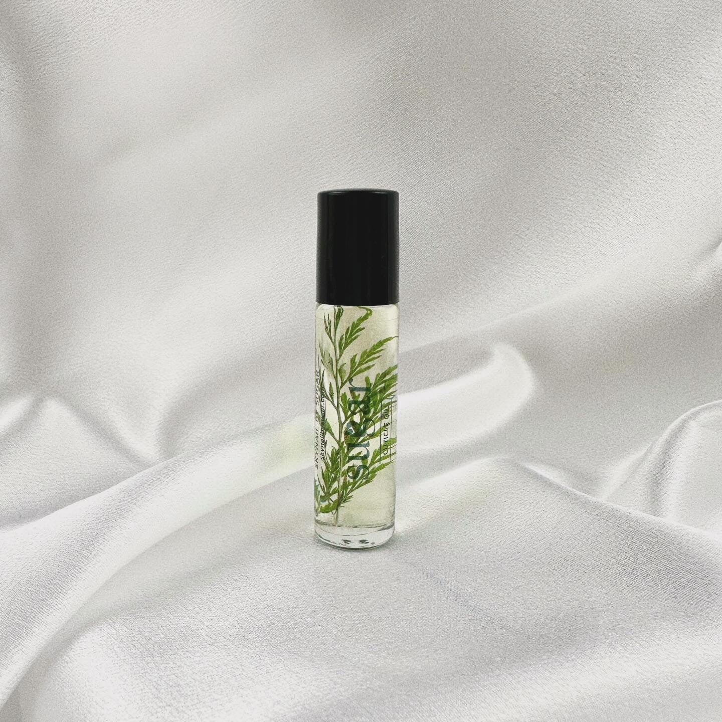 Bottle of wood 100% Organic Cuticle Oil from Skynailbysugar