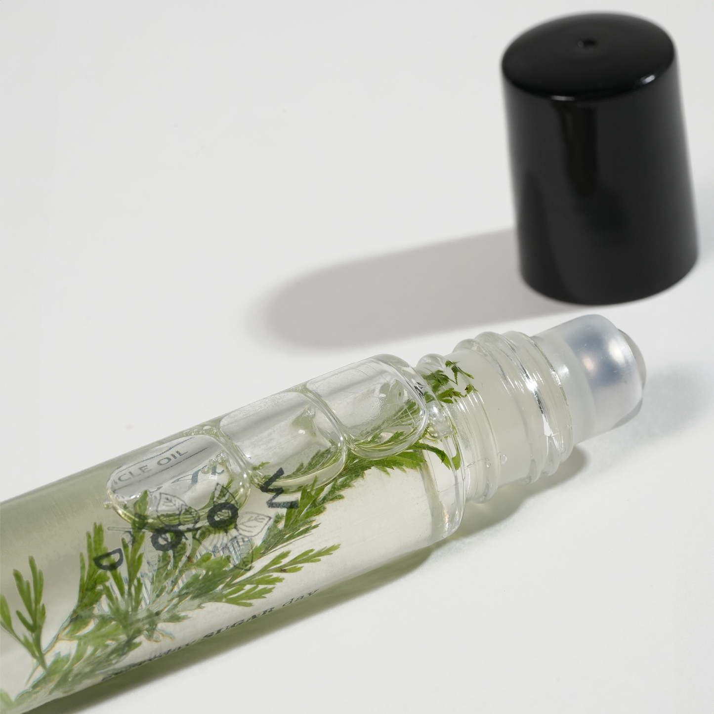 Bottle of wood 100% Organic Cuticle Oil from Skynailbysugar