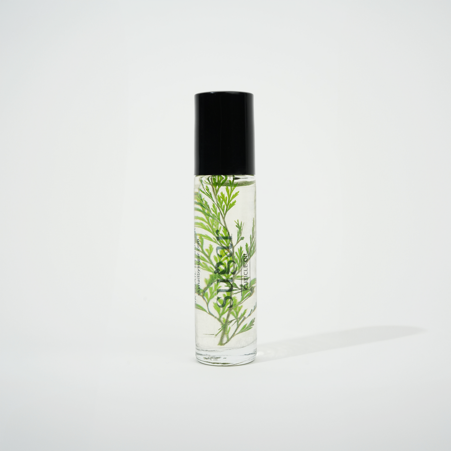 Bottle of wood 100% Organic Cuticle Oil from Skynailbysugar